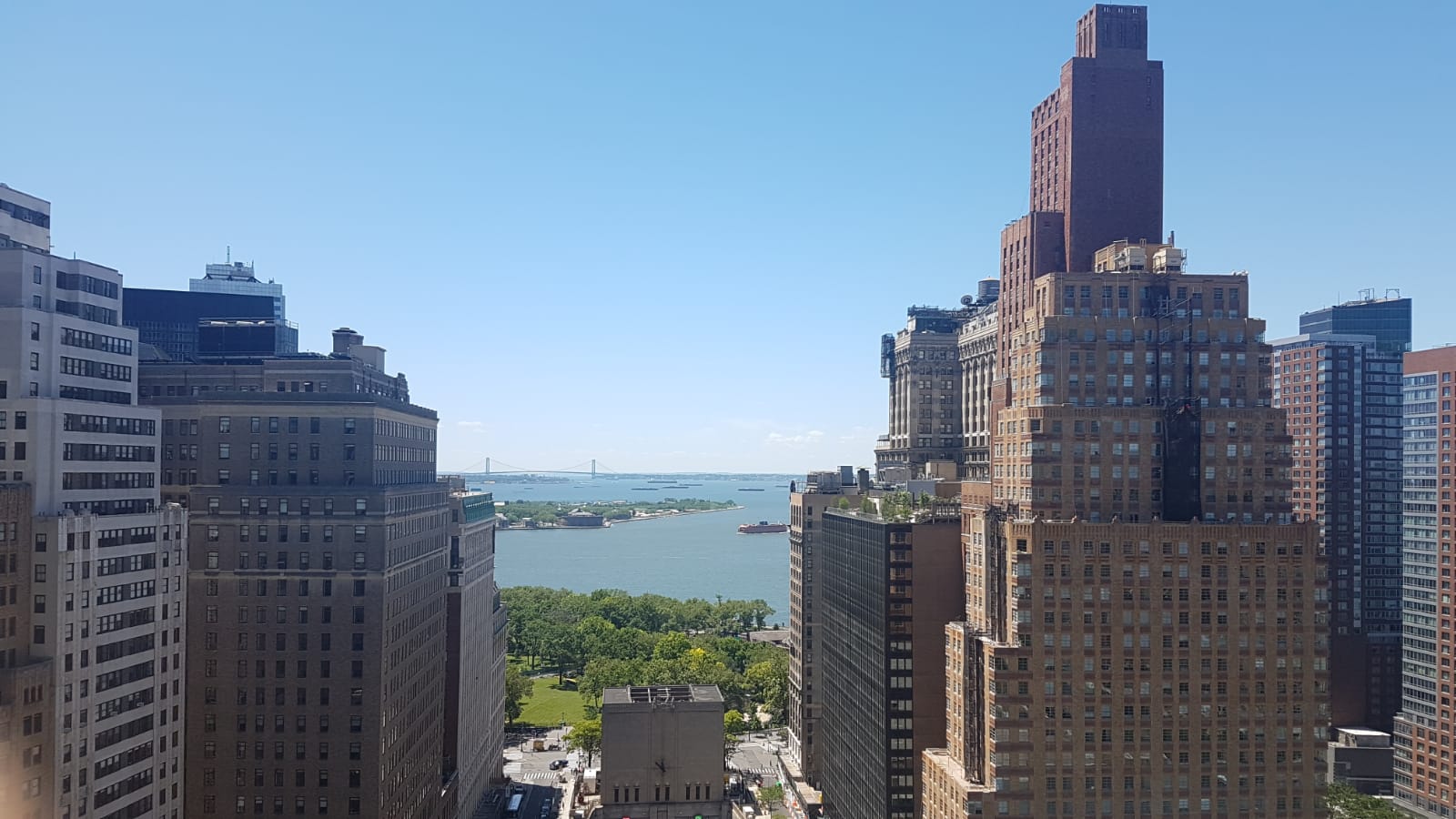 Manhattan rooftop. Men in Black headquarters.